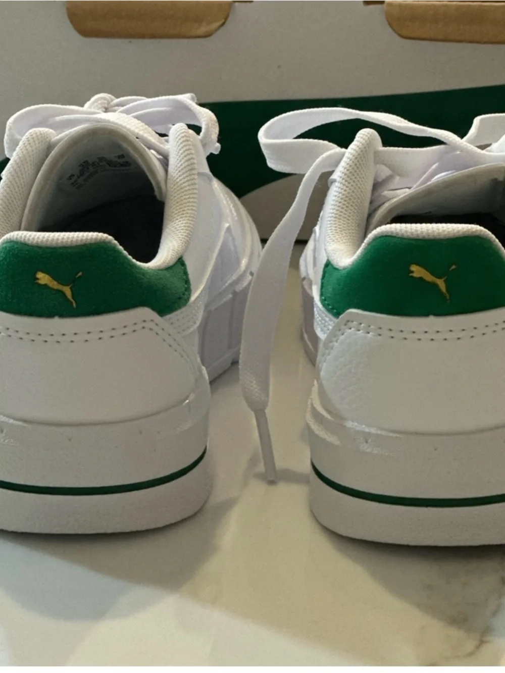 Puma Kids White Sneakers with Green Heel Accent